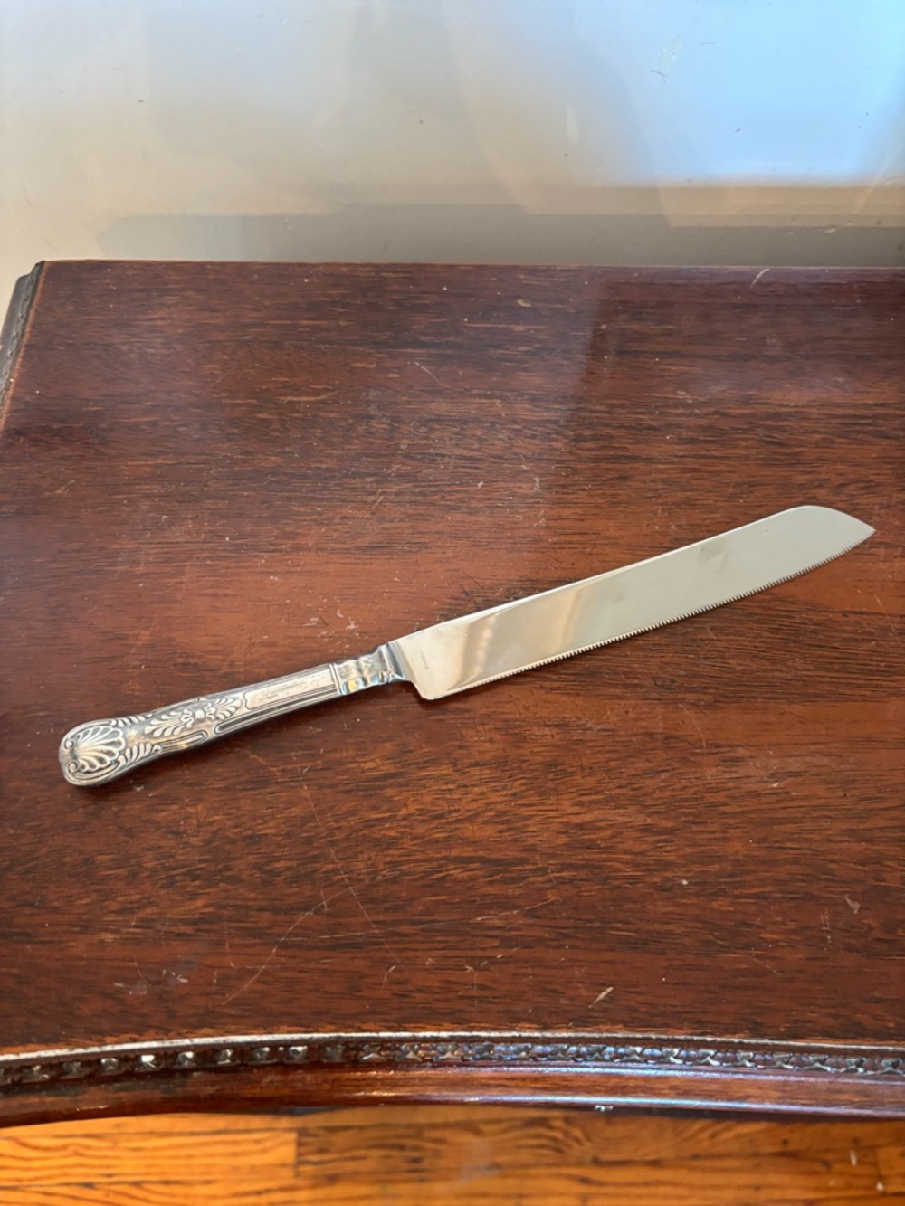 Ornate Silver-Handle Cake Knife - Decorative Floral Pattern